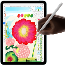 iPad Air, hand using Apple Pencil Pro to draw a colorful image of a flower on the Adobe Fresco app